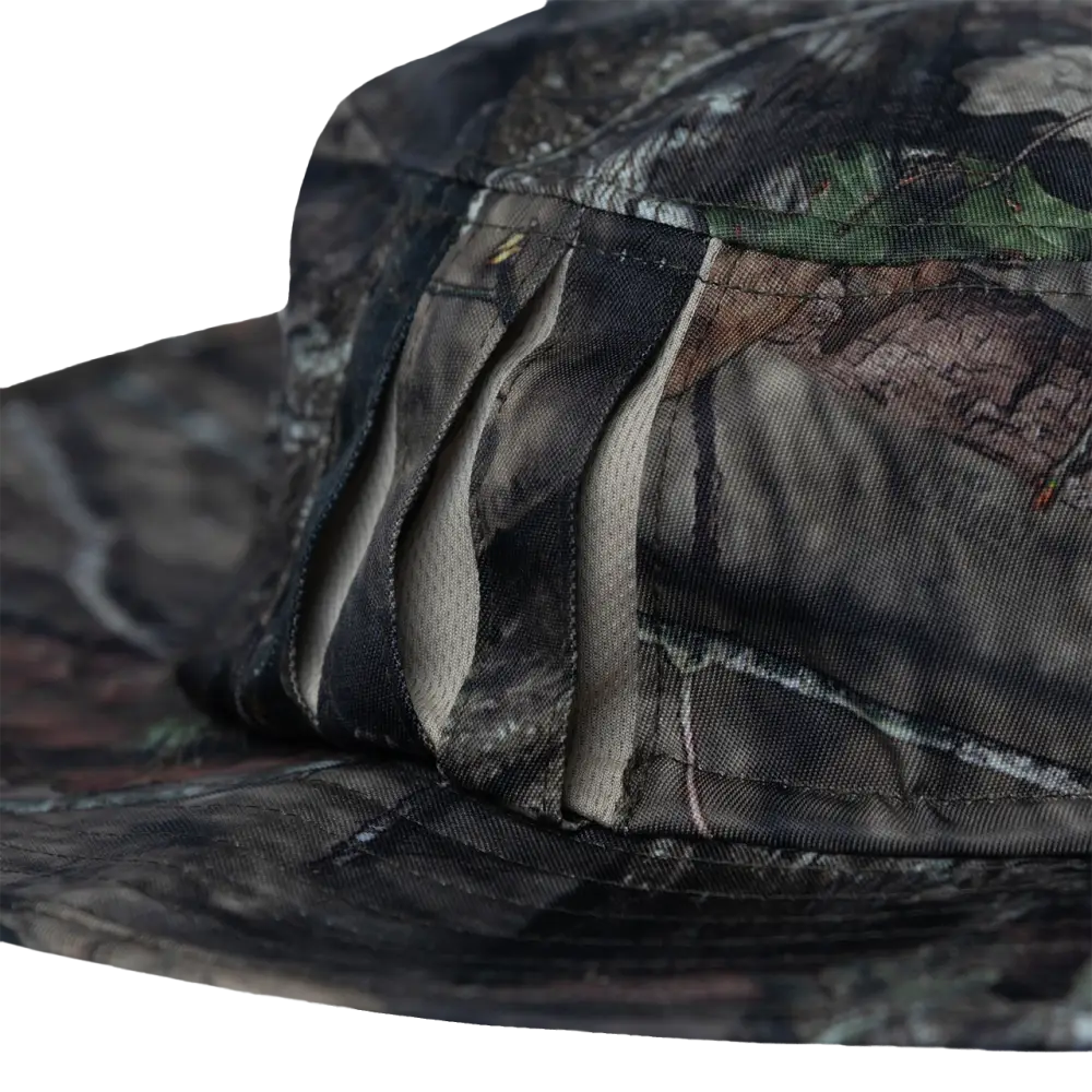 Camouflage-patterned wide-brimmed hat.