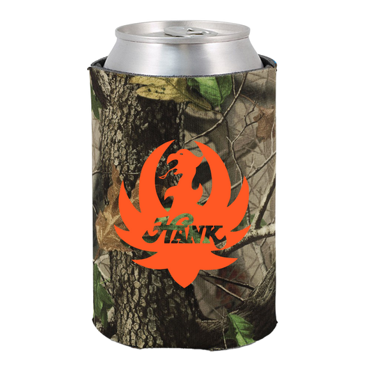 Camouflage-patterned drink cooler sleeve with an orange logo.