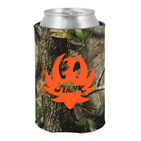 Camouflage-patterned drink cooler sleeve with an orange logo.