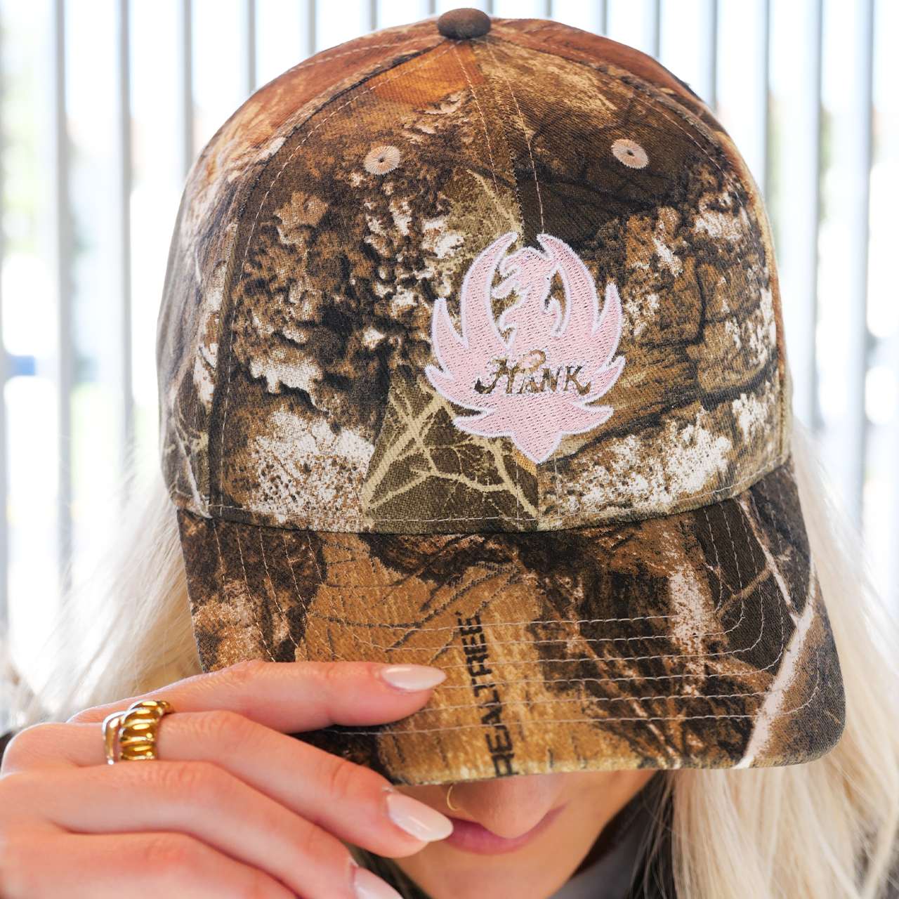 Camouflage baseball cap.