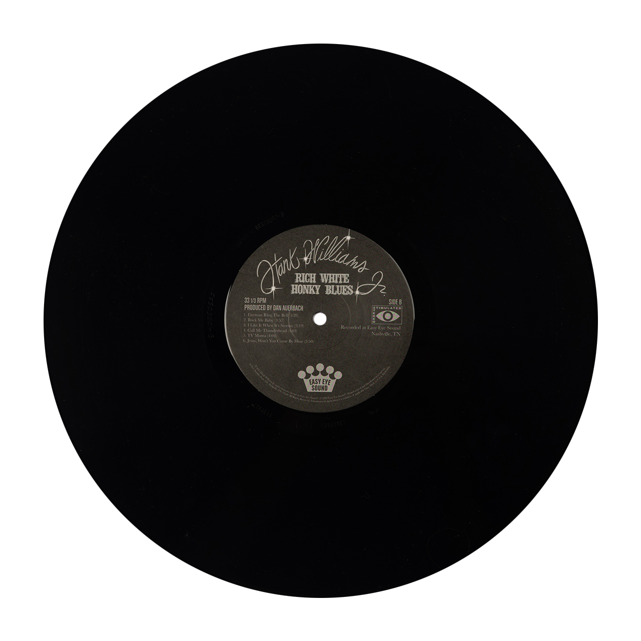 Vinyl record with a black label visible on its surface.