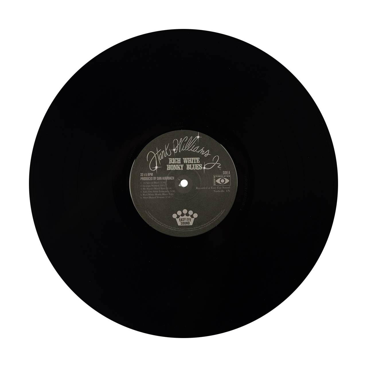 Vinyl record with a black label visible on its surface.