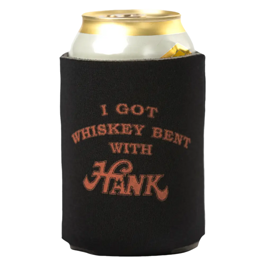 Black drink koozie with orange text reading ’I GOT WHISKEY BENT WITH HANK’ holding a beverage can.