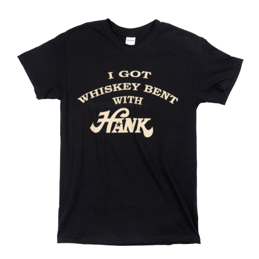 Black t-shirt with white text reading ’I GOT WHISKEY BENT WITH HANK’.