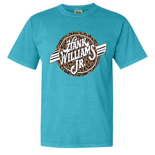 Teal t-shirt featuring a Hank Williams Jr. logo with leopard print design.